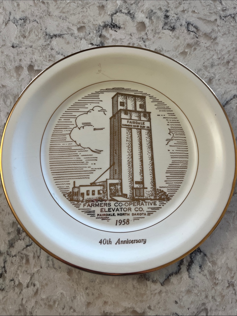 Commemorative plate from Farmers Co-operative Elevator 40th Anniversary.